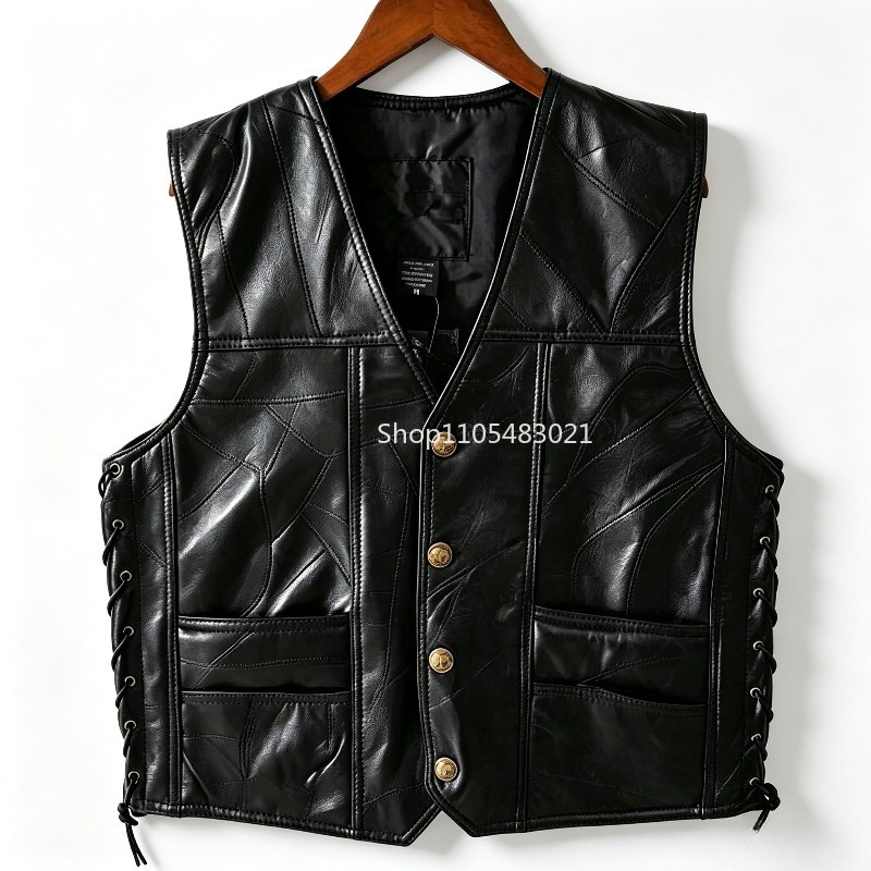 Leather Work Jacket - เสื้อกั๊กหนังผู้ชายสีดำแบบปะติดปะต่อ สไตล์ไบค์เกอร์ ติดกระดุม แขนกุด พร้อมเชือกผูกด้านข้างและกระเป๋า สำหรับสตรีทแวร์